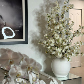 Konos vase with cherry blossoms